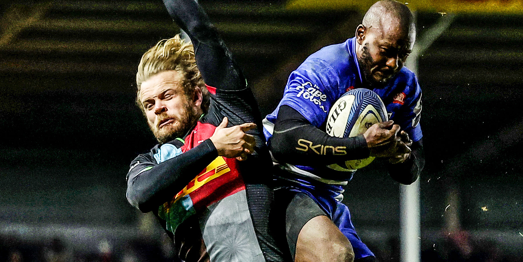 Seabelo Senatla wins a high ball against Tyrone Green.