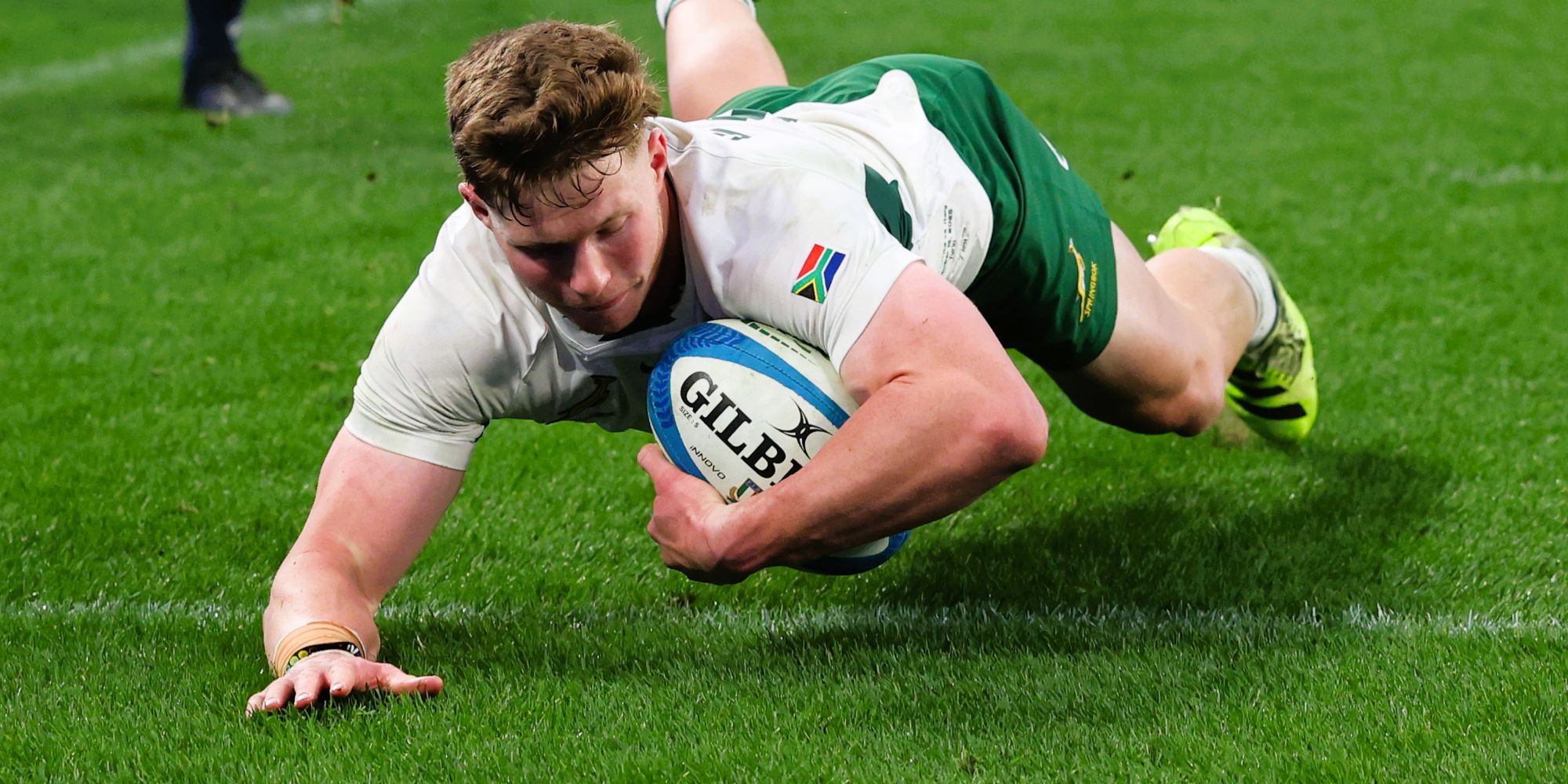 Ethan Hooker goes over for his first try for the Boks.