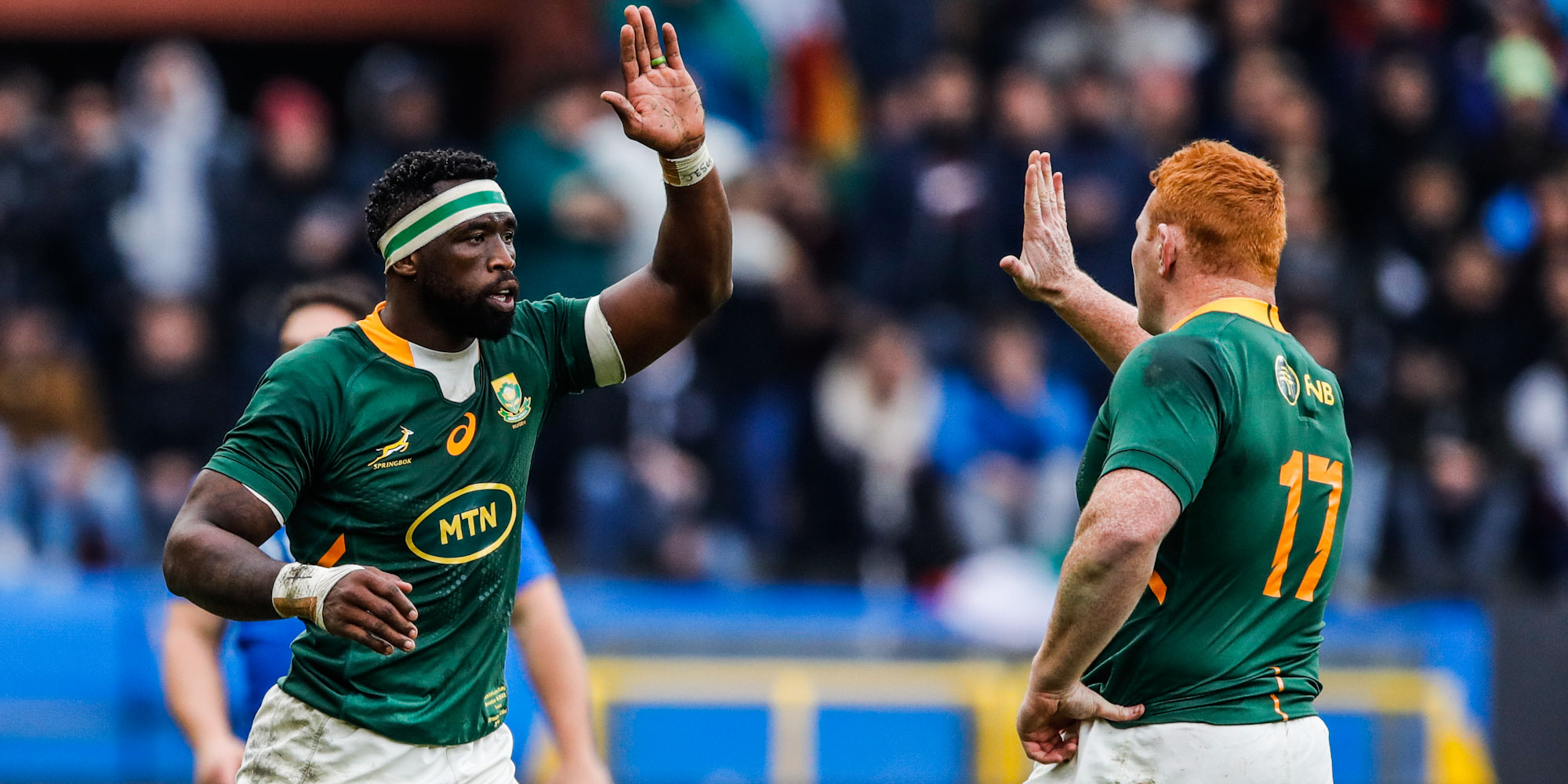 High five from Siya Kolisi after his second Test try, against Italy in Genoa in 2022.