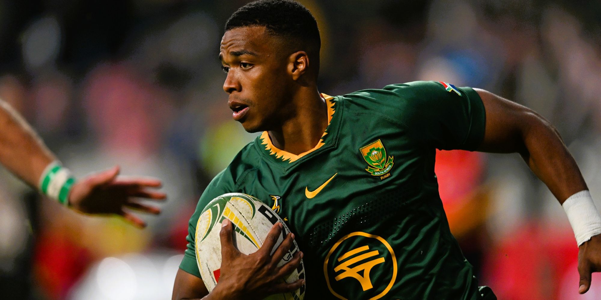 Grant Williams races clear for the first try of the Test.
