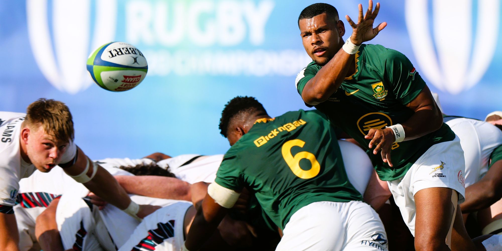 Haashim Pead clears the ball in the pool match against England.